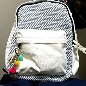 White Backpack with fuzzy charms